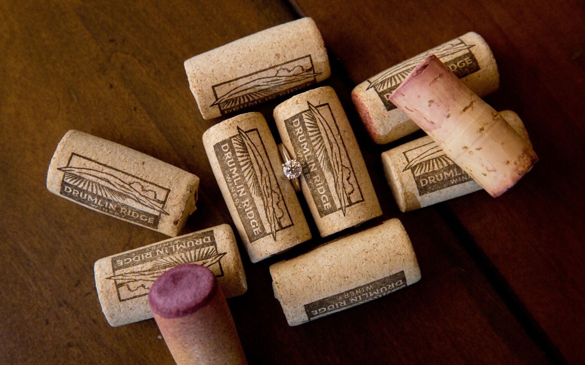 engagement ring nestled amongst wine corks from Drumlin Ridge Winery