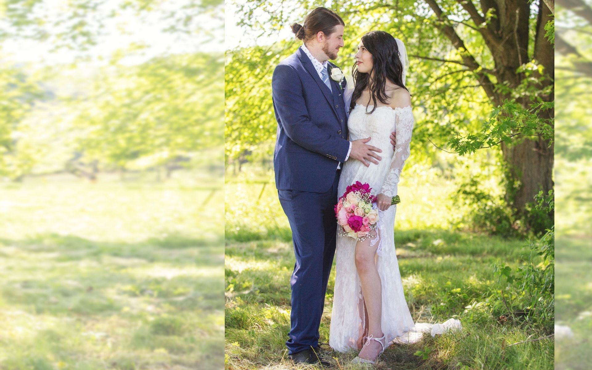 bride and groom look at each other, pink & red bouquet