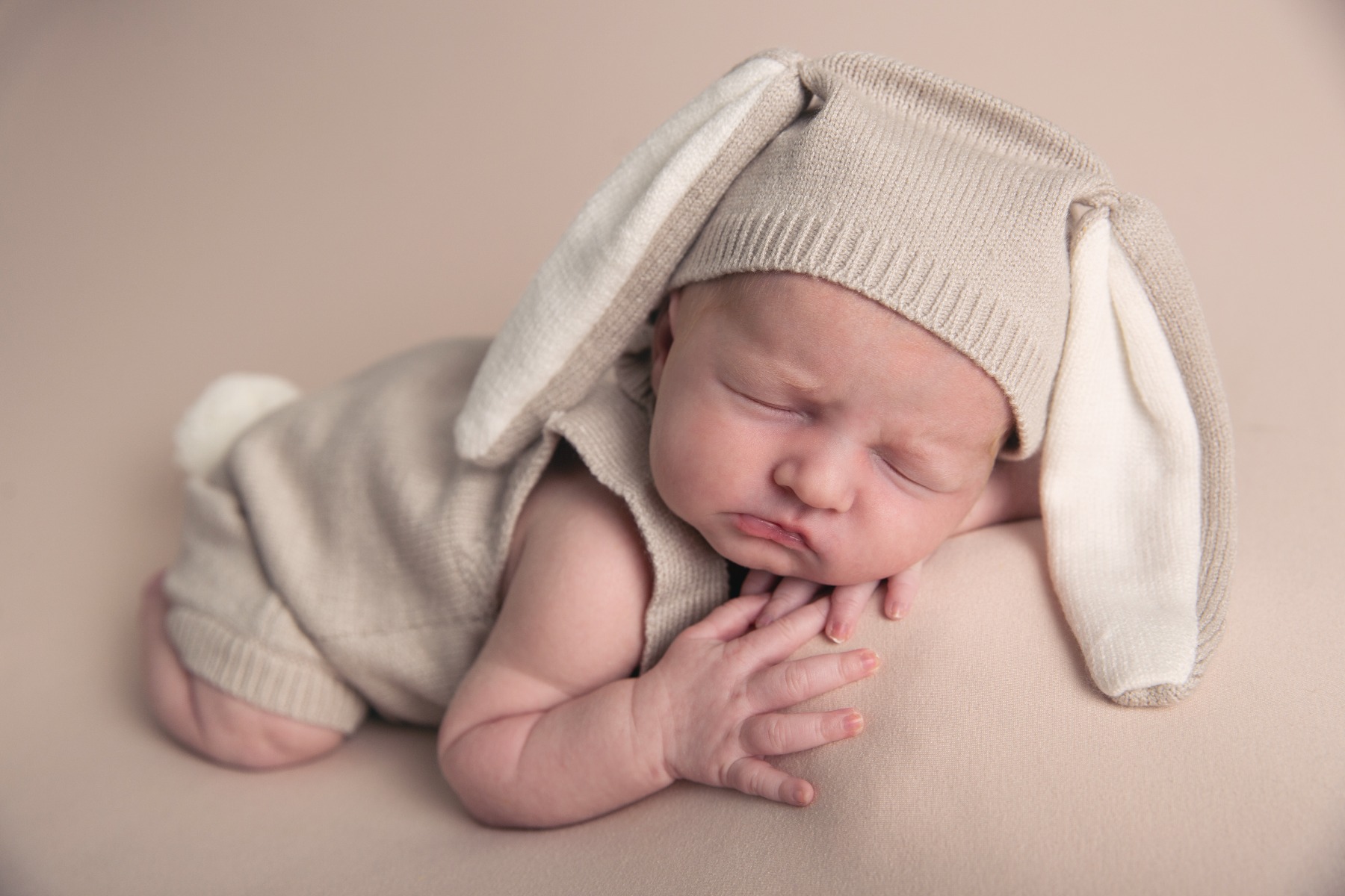newborn baby in a bunny outfit