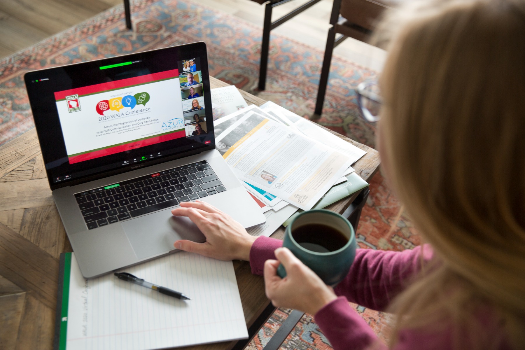 working photo of a laptop & employee for Wisconsin Assisted Living Association